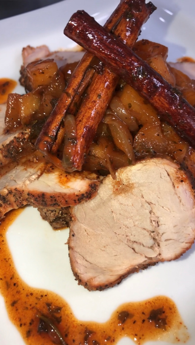 Pork tenderloin served with sautéed garden vegetables, plated after a three-minute rest at 145°F