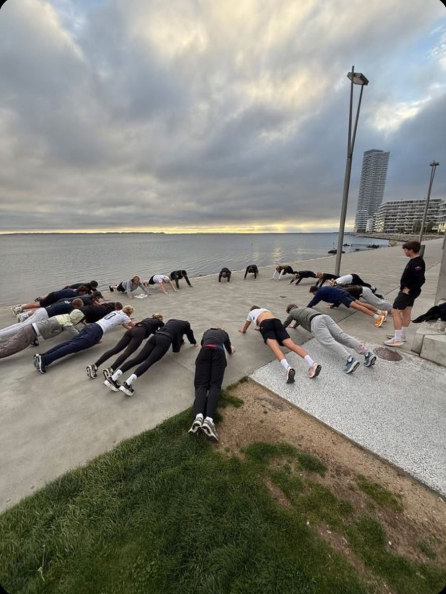 Younes Eddiki, strength coach from Morocco teaching a live online home workout class for the second strength day of a weekly practice