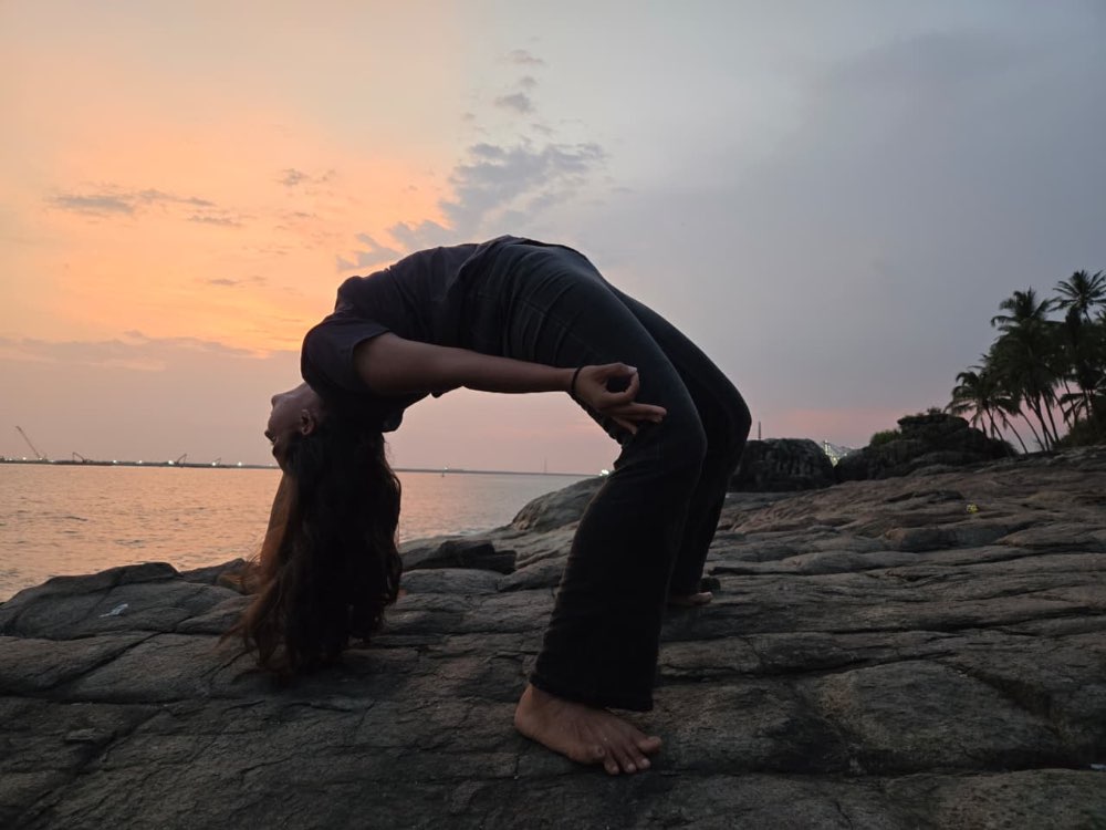 Anahita Pooja Kapur, yoga instructor from India teaching a live hip opener class covering the equestrian lunge used in Surya Namaskar poses