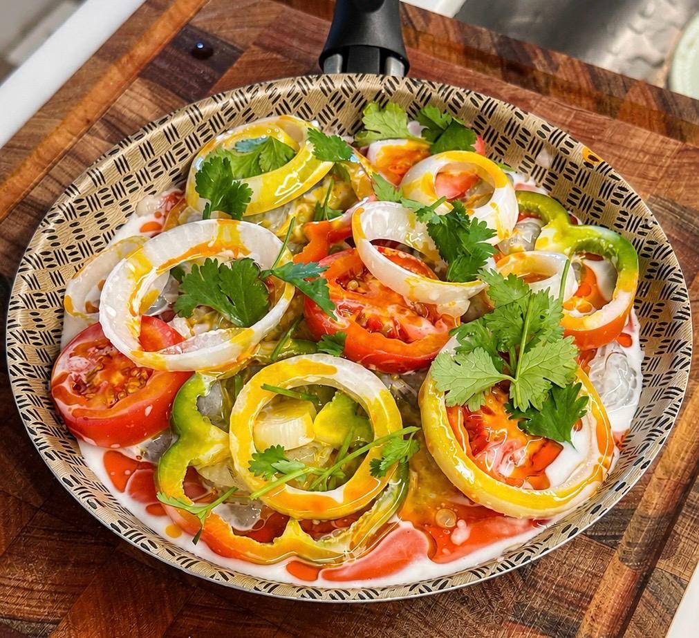 Brazilian moqueca seafood stew served with rice, the traditional accompaniment, taught in a live online Brazilian cooking class