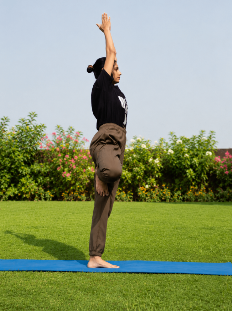 Dhwani, certified yoga instructor from India teaching a live online yoga for balance and stability class covering standing balance poses and balancing asanas